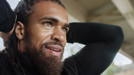 Portrait of handsome male sweating after a workout