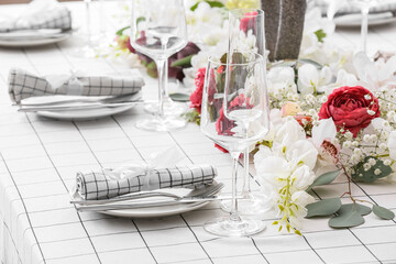 Beautiful table setting for wedding with flowers
