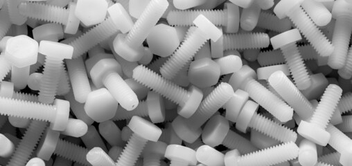 plastic screws, macro photo, background or texture