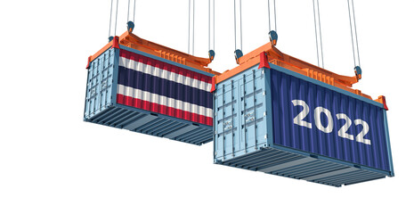 Trading 2022. Freight container with Thailand national flag. Isolated on white. 3D Rendering 