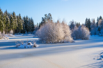 Frozen lake in a wintry beautiful landscape