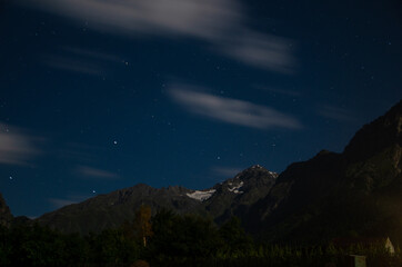Obraz na płótnie Canvas night sky and mountains