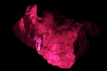 Magic and mystical lighting inside Cave of the Winds stalactite cavity hollow attraction near...