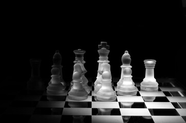 Glass chess on glass chessboard	