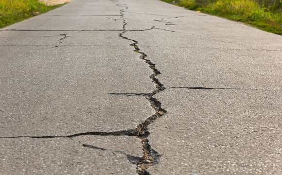 Surface Of Concrete Driveway With Crack