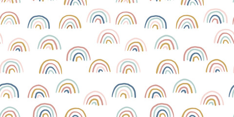 Hand-drawn rainbow pattern. Cute boho, abstract rainbow doodle. Seamless vector baby pattern in muted colors.