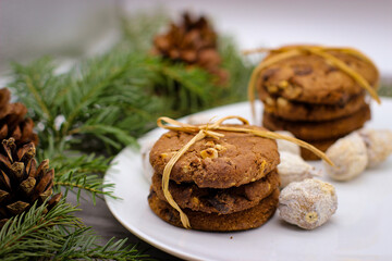 Fototapeta na wymiar Christmas motifs. Delicious cookies for Santa.