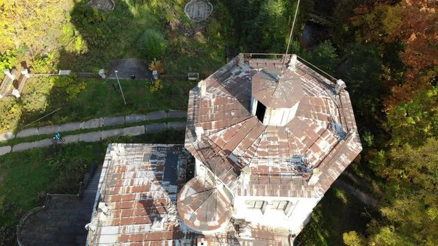 Abandoned manor Mikhailovka estate, palace and park of the 19th century. Peterhof, public access, Saint-Petersburg. Autumn. Aerial drone view. Flying over. View from top down. Drone is moving back