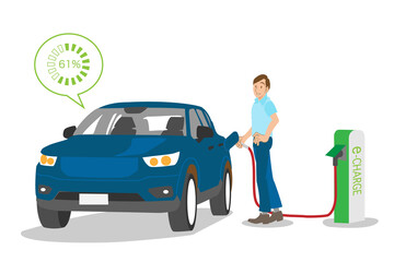 電気自動車に充電する男性