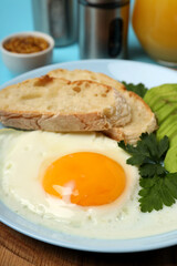 Concept of tasty breakfast on blue background