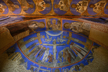 Frescos and murals in ancient cave church of the Buckle or Tokali Kilise painted in directly onto...