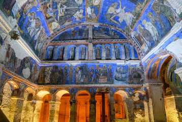 Frescos and murals in ancient cave church of the Buckle or Tokali Kilise painted in directly onto...