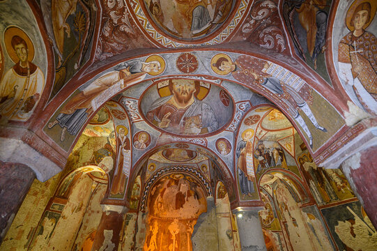 Frescos and murals in ancient cave Apple Church or Elmali Kilise painted in directly onto rock, Goreme, Cappadocia, Turkey