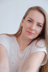 beautiful young woman posing in photo studio