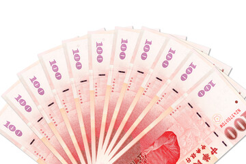 some 100 taiwan dollar bank notes with copy space above on white background