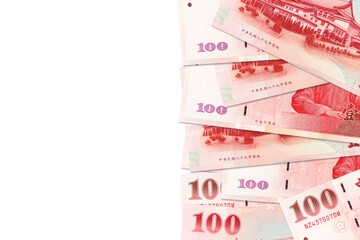 some 100 taiwan dollar bank notes with copy space to the left