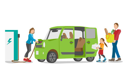 電気自動車でショッピングする日本人家族