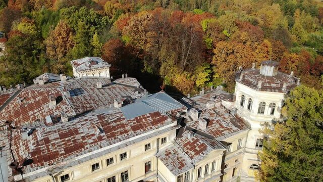 Abandoned manor Mikhailovka estate, palace and park of the 19th century. Peterhof, public access, Saint-Petersburg. Autumn. Aerial drone view. Flying over. View from top down. Drone is moving forward