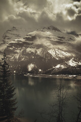 Oeschinensee, Kandersteg Switzerland, in spring with fog and snow