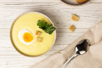 cream soup with cheese potato egg