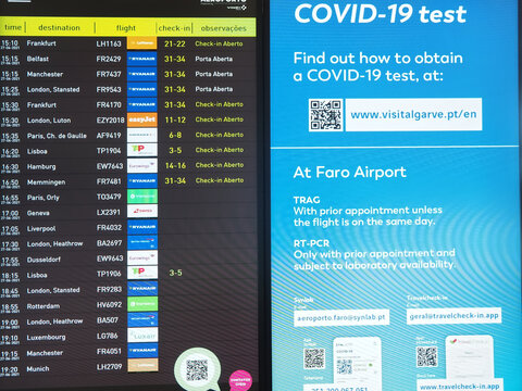 Timetable of flight departures at Faro airport in Portugal with covid-19 test notice