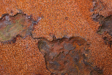 A close-up of rusting metal on a junkyard
