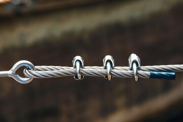 close up steel turnbuckle and sling steel in construction site