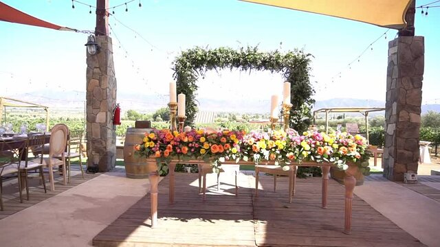 A wedding venue decorated with flowers and plants.