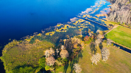 Aerial drone view of North Florida Countryside lake with wooden dock