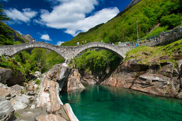 Ponte dei Salti Lavertezzo, stone bridge over the Verzasca river in Switzerland in spring 2021