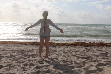 girl on the beach in the morning