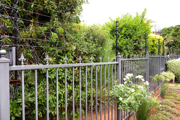 An electrified fence surrounding an urban property to deter criminals from entering in Worcester, South Africa