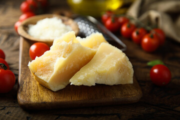 Parmesan cheese on a wooden desk