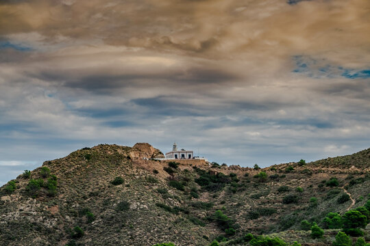 The lighthouse of El Albir in the Sierra Helada, Alicante, Spain