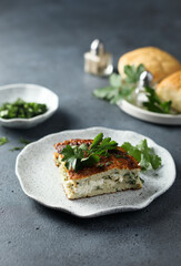 Traditional homemade frittata with herbs and cheese