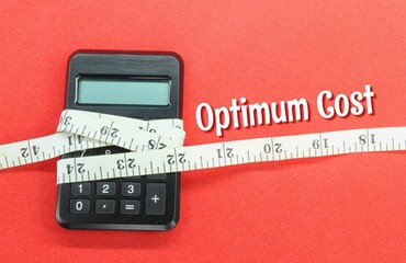the calculator is wrapped with a measuring tape and the word optimum cost