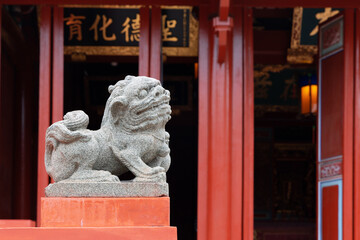 Stone lion statue in Chinese Confucius temple.