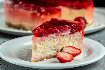 delicious sweet dessert piece of cheesecake with berries on table close up