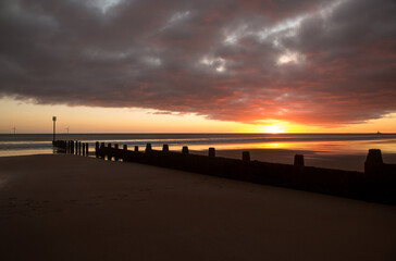 Fototapeta premium Sunrise to start the day at Blyth beach in Northumberland