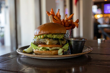 Guacamole Burger with Sweet Potato Fries