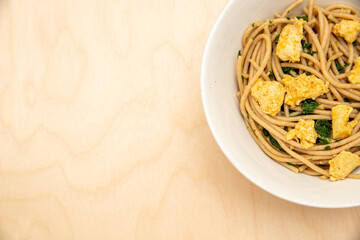 top view of chicken pasta with copy space