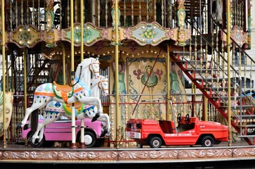 View of the Eiffel Tower with carousel beside, Paris, France