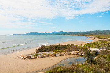 Beautiful coastline of Costa Azahar (Orange tree Coast) in the Valencian Community with ocean, beach and mountains in Spain.