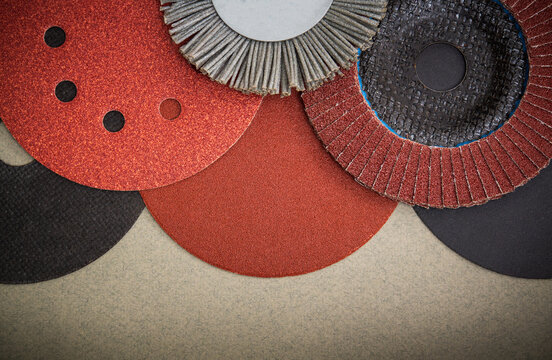Big set of abrasive tools and sandpaper used for cleaning or grinding products. Industrial tools.