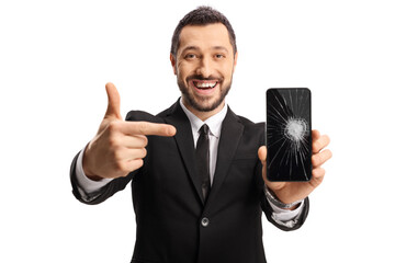 Businessman holding a smartphone with a cracked screen