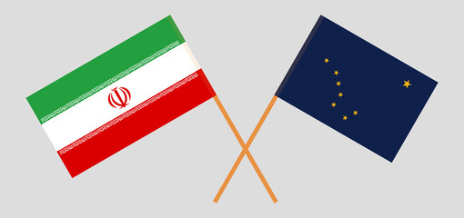 Crossed flags of Iran and the State of Alaska. Official colors. Correct proportion