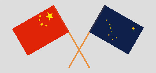 Crossed flags of China and the State of Alaska. Official colors. Correct proportion