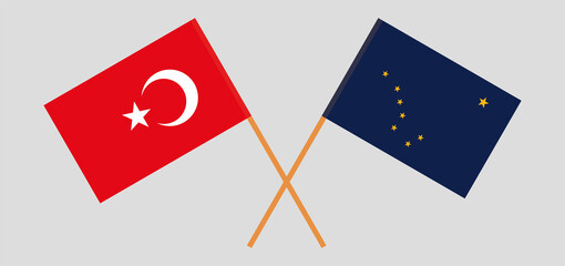Crossed flags of Turkey and the State of Alaska. Official colors. Correct proportion