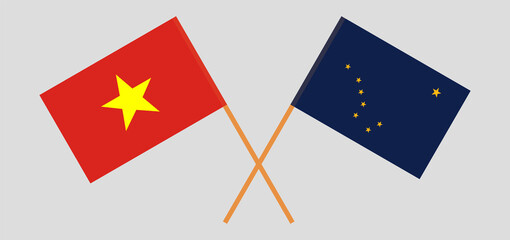 Crossed flags of Vietnam and the State of Alaska. Official colors. Correct proportion
