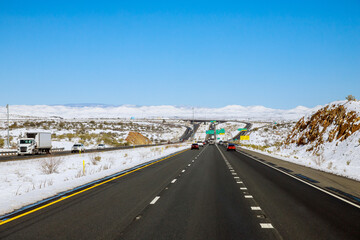 Panorama view of snowy mountain desert after the snowstorm in Arizona winter with of Interstate I-17
